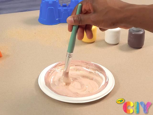 Mixing paint to get the perfect sand colored paint