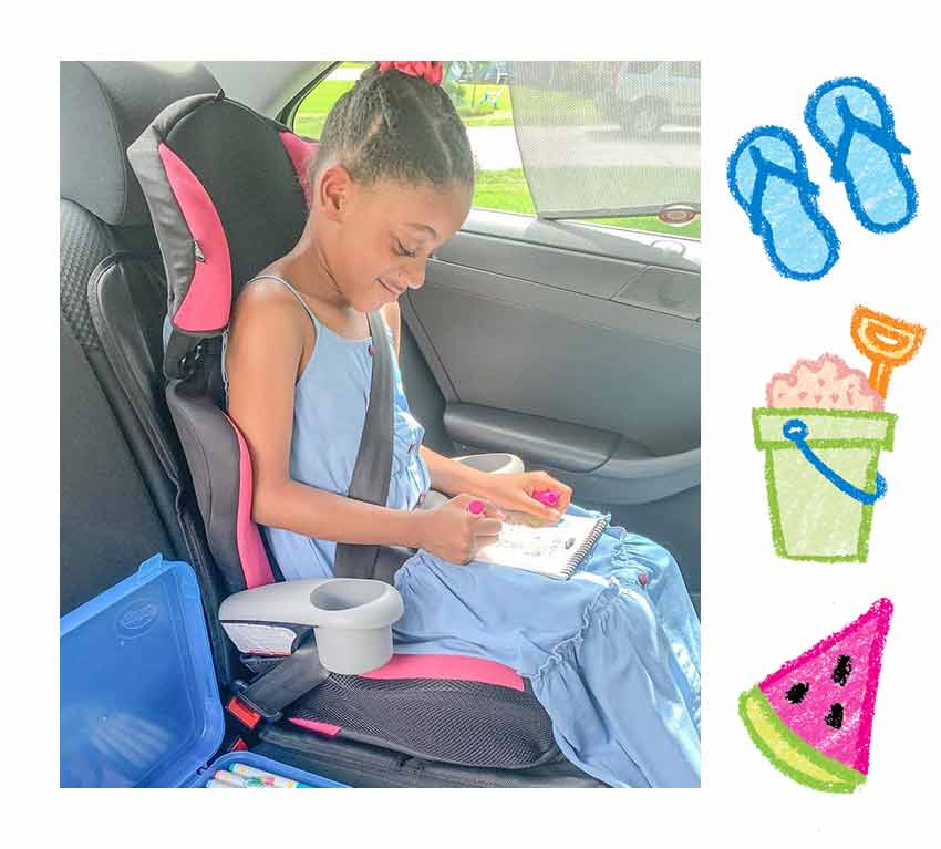 Kid coloring with Crayola supplies in car