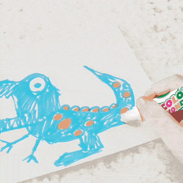 Kid coloring dinosaur on blank Color Wonder Paper