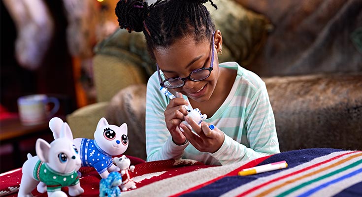 Child with Jumbo Scribble Scrubbie Pets