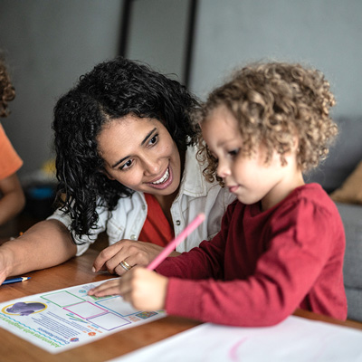 mother and child filling out a thinking sheet