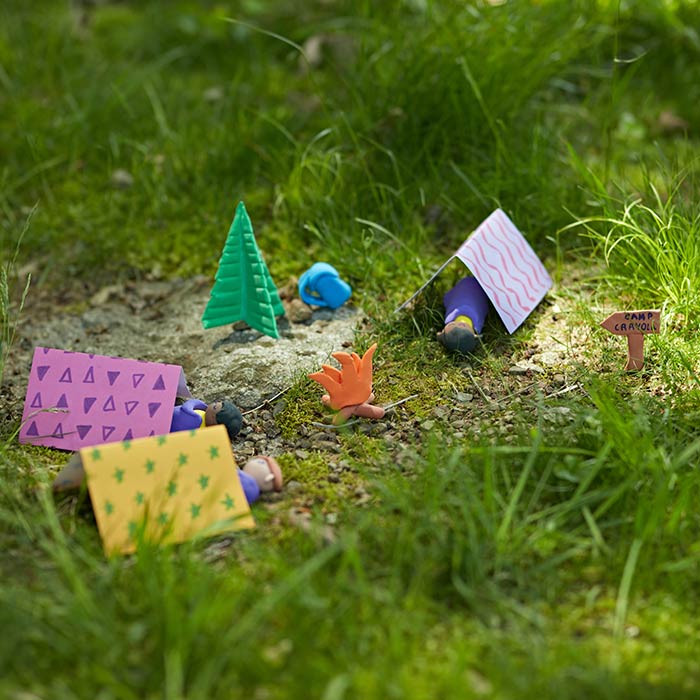 model magic camping craft. craft in grass. front view.