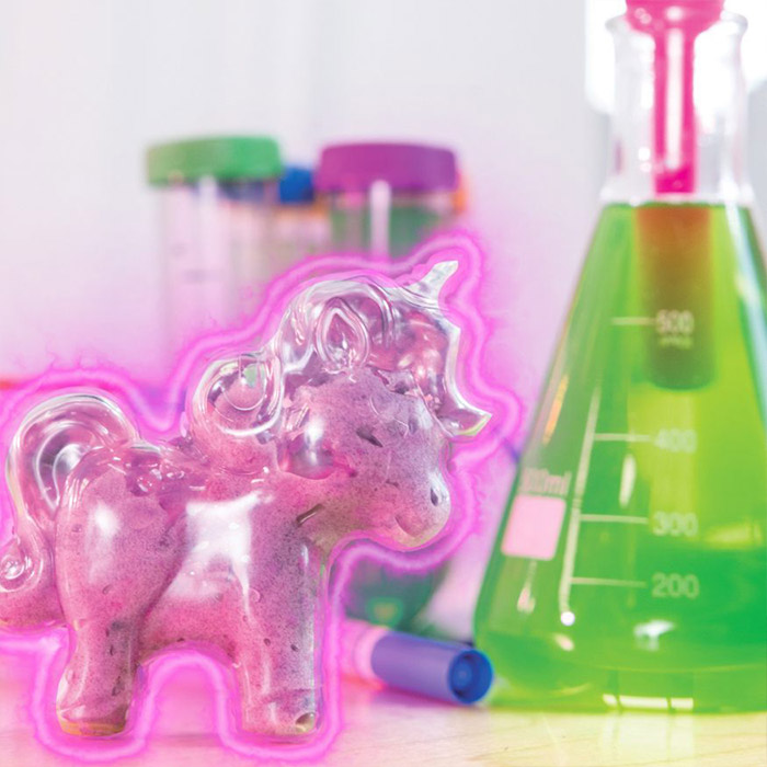 Person playing with Crayola Goo with confetti mixed into it