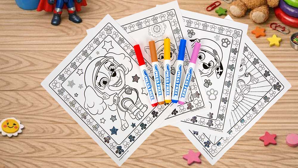 PAW patrol color wonder mess free coloring sheets and markers on table surrounded by kids toys.