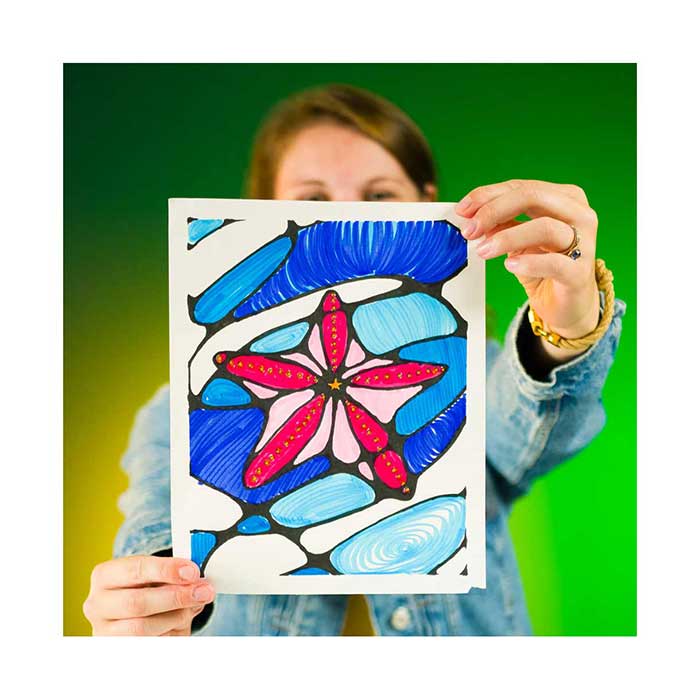 Crayola x Cupixel My Gallery Art Set. Person holding final artwork.