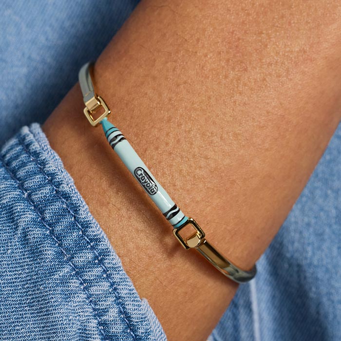 Crayola Teacher Appreciation Crayon Tension Bangle. Tension bangle on wrist.