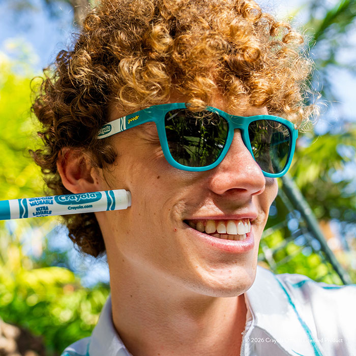 Crayola x GoodR Sunglasses, Tropical Colors. turquoise surf on model.