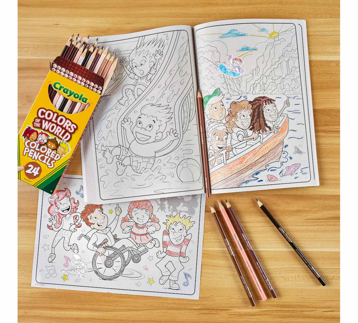 Colors of the World Colored Pencil 6pk Bundle box of colored pencils on table with coloring book