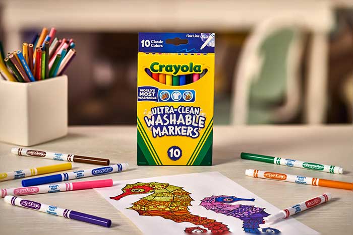 Ultra-Clean Markers, Fine Line, Classic Colors, 10 ct.. marker box surrounded by markers and completed coloring page.
