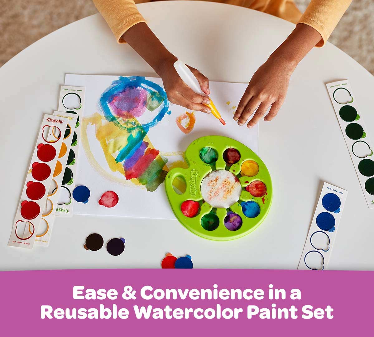Washable Pop & Paint Watercolor Palette  ease and convenience in a portable paint set.  Child using paints at a table.