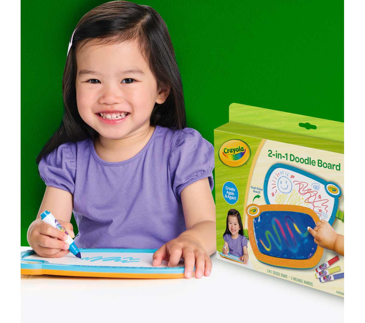 2-in-1 doodle board. Young girl drawing on reusable surface.
