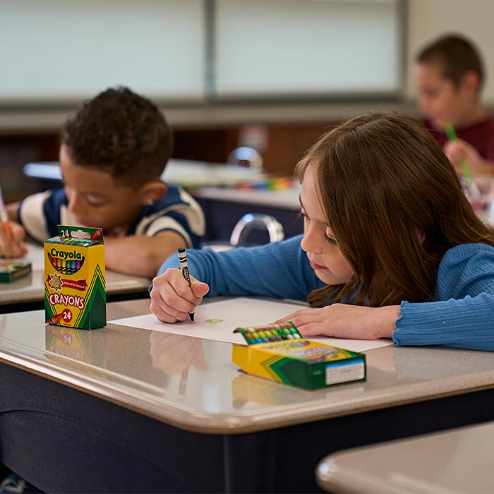 Children having fun at school using Crayola products.