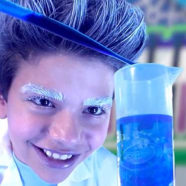 Kid doing Color Chemistry science experiment